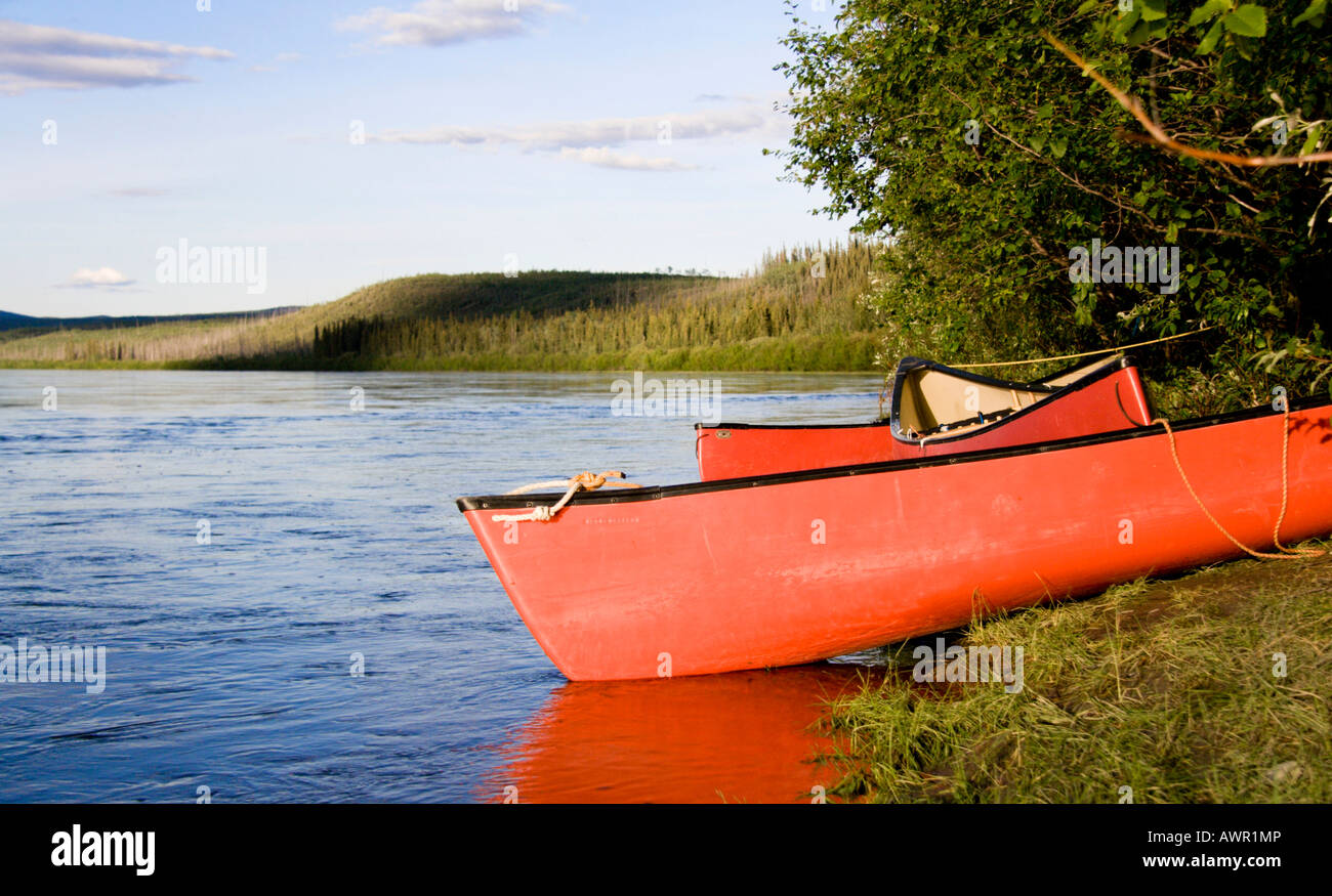 Red canoe, Yukon River, Yukon Territory, Canada Stock Photo Alamy
