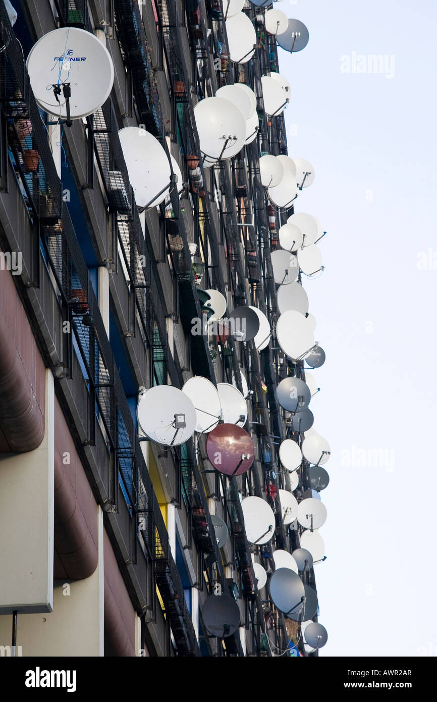 Apartment building many satellite dishes hires stock photography and