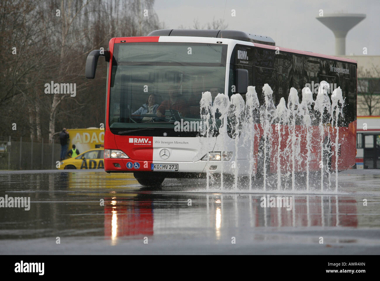 Busdrivers during a safety test on hydroplaning, Germany Stock Photo