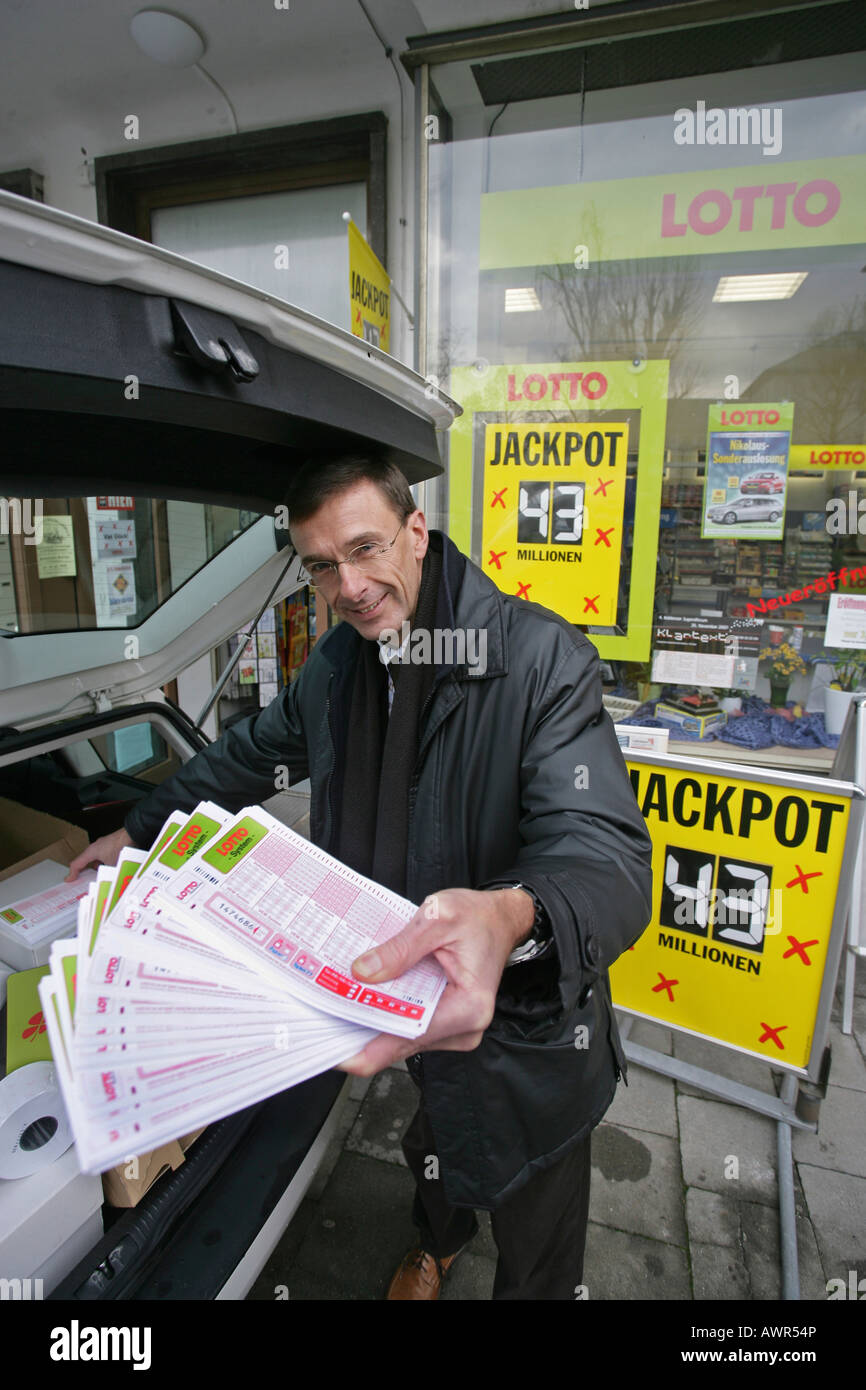 Toni Schweizer, head of general agency from Lotto Rheinland-Pfalz, deliver more lottery tickets to the receiving offices. The l Stock Photo