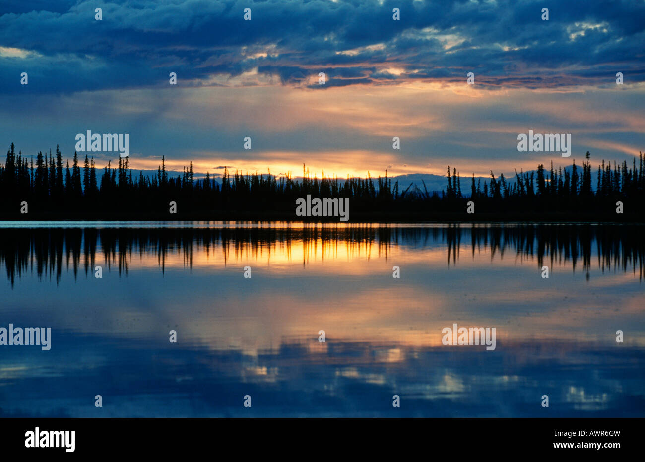 Sunset reflected on a lake in southeastern Alaska, USA Stock Photo