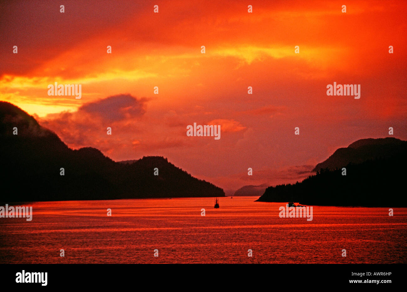 Sun setting over fjord, southeastern Alaska, USA Stock Photo