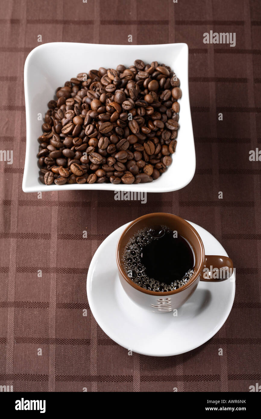 Cup of filter coffee and coffeebeans Stock Photo