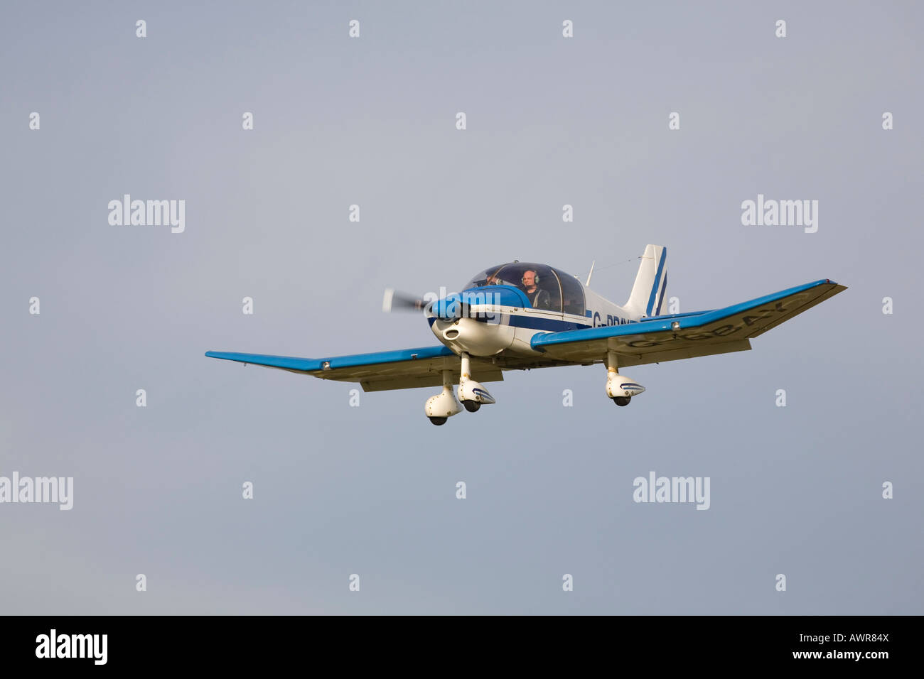 Avions Peirre CEA DR400-140 Major G-BBAY in flight on final approach to land Stock Photo