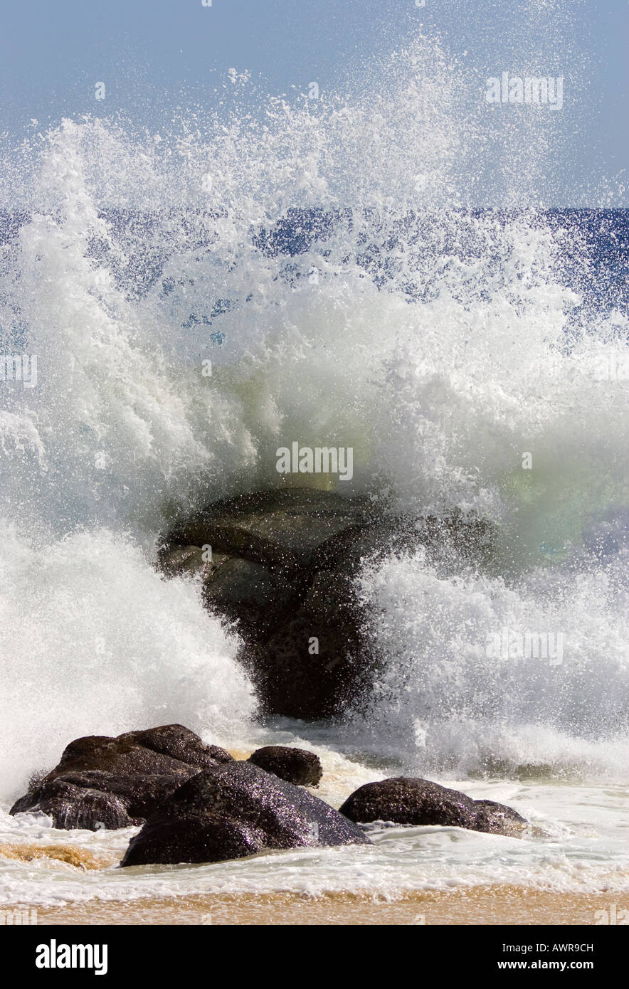 Big Wave Crashing on Rocks Stock Photo - Alamy