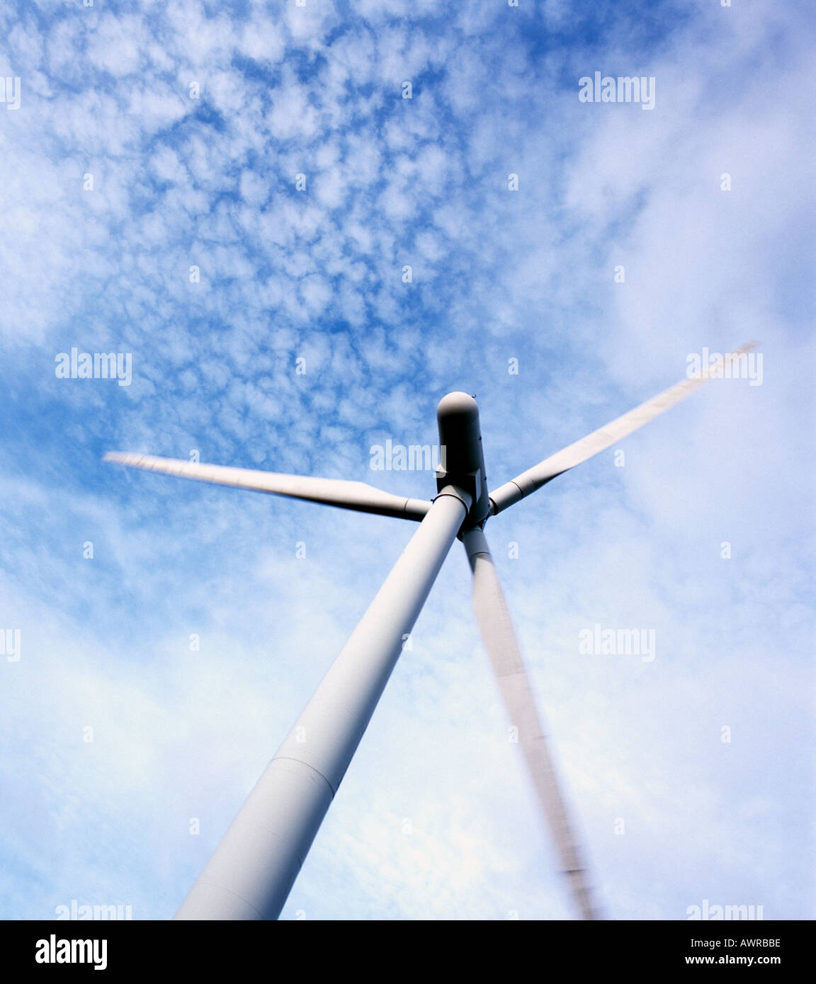 WIND TURBINE AGAINST BLUE SKY WITH CLOUDS Stock Photo - Alamy