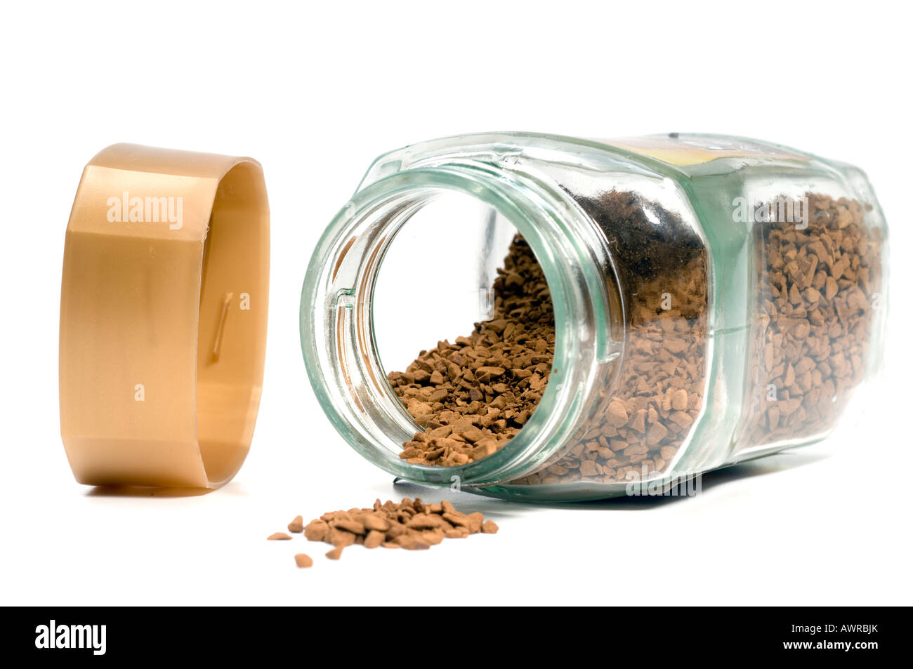 Instant coffee granules spilling onto a white surface Stock Photo Alamy