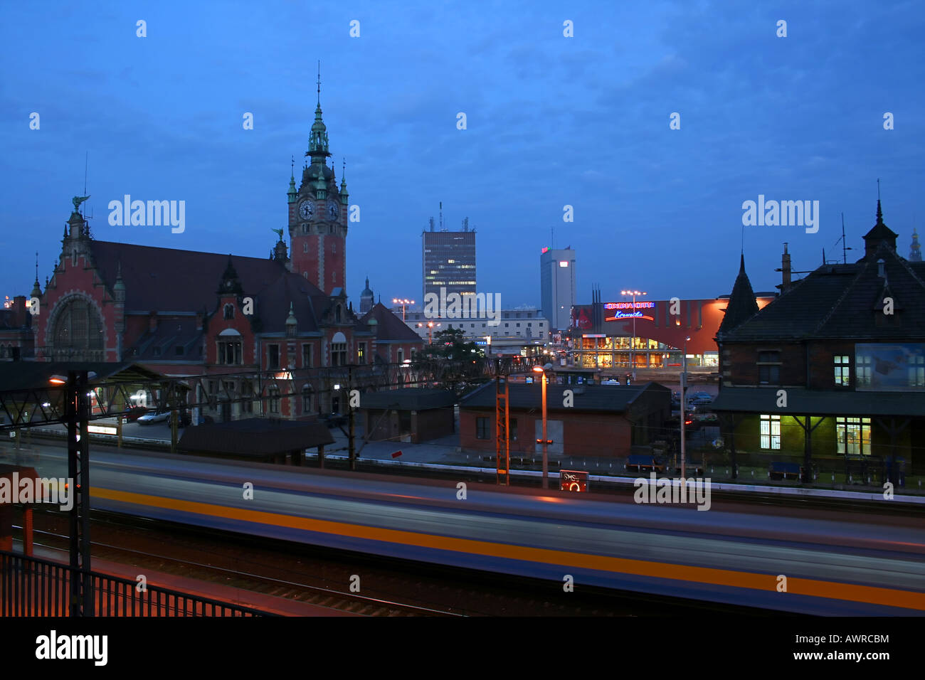 Train arriving at the railway station in Gdansk Stock Photo