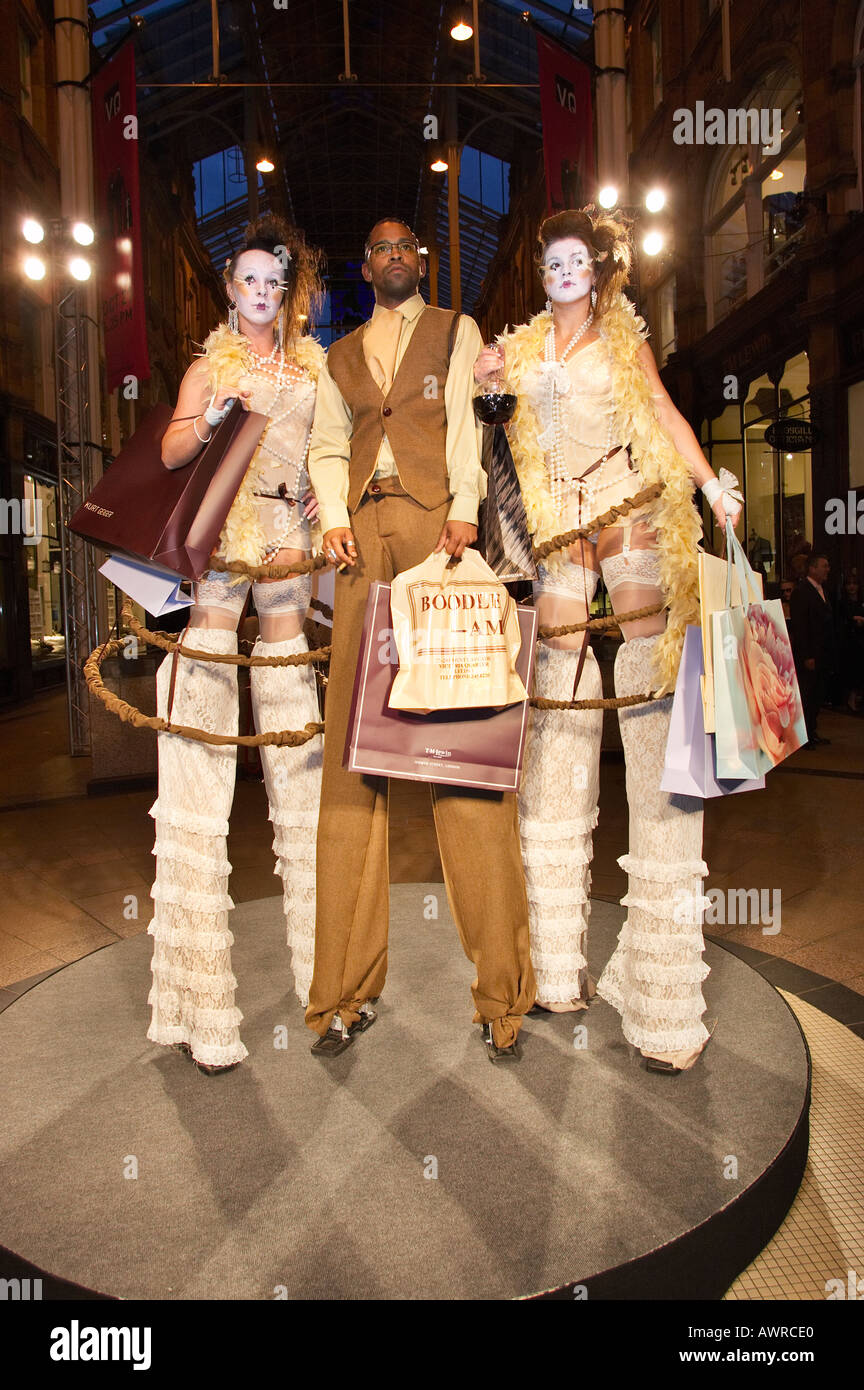 street performance artists on stilts Stock Photo Alamy