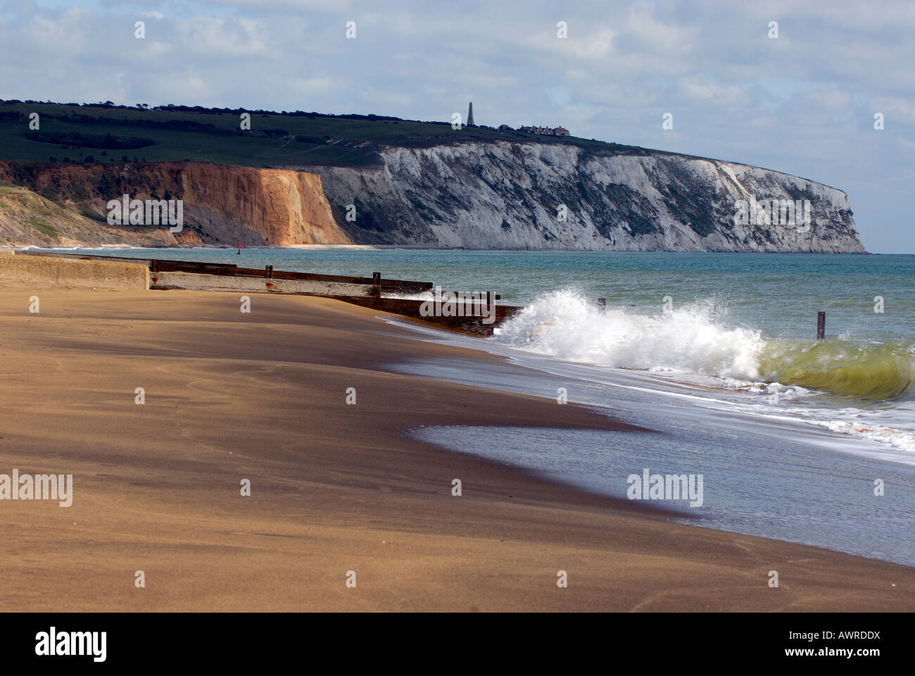 the cliffs and monument at culver sandown shanklin on the isle of wight showing beaches at yaverland and waves crashing on shore Stock Photo