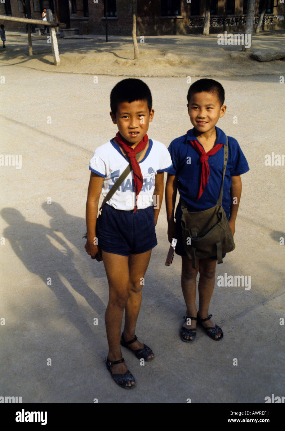 Boys in Little Red Guards or Young Pioneers youth organization wearing red scarves in 1976 at Peking Number 2 Cotton Mill Stock Photo
