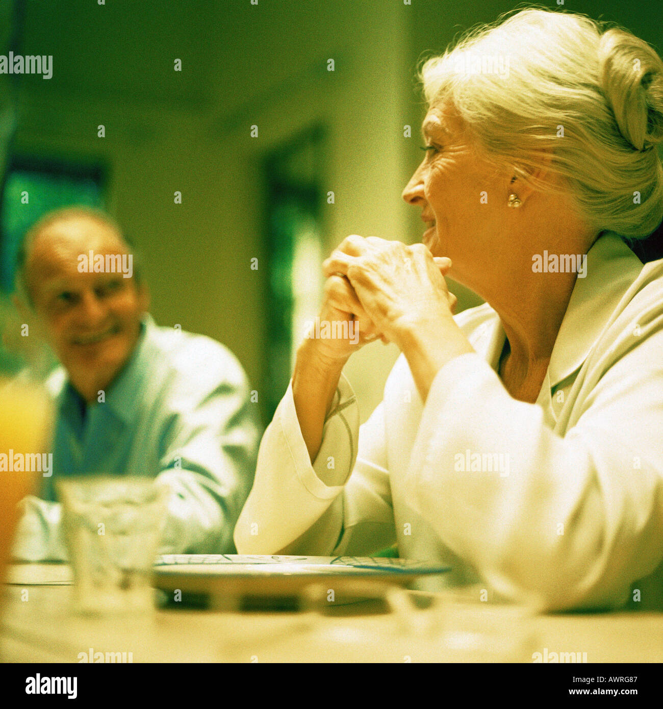 Woman elbows table hi-res stock photography and images - Alamy