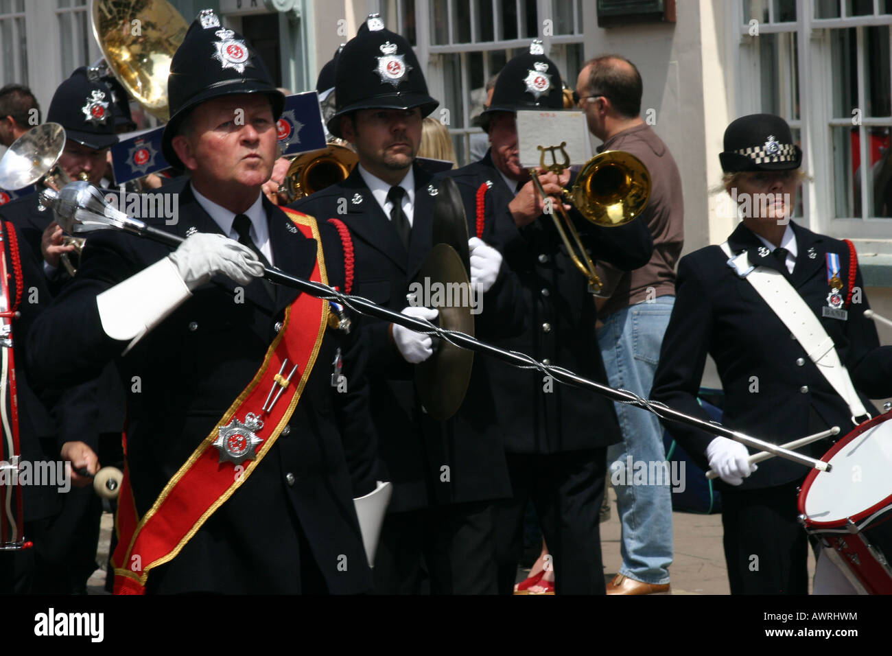 police band marching playing leader with baton dickens festival Stock Photo Alamy