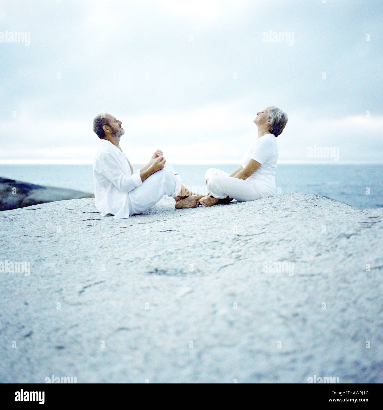 Two women sitting facing each other hi-res stock photography and images ...