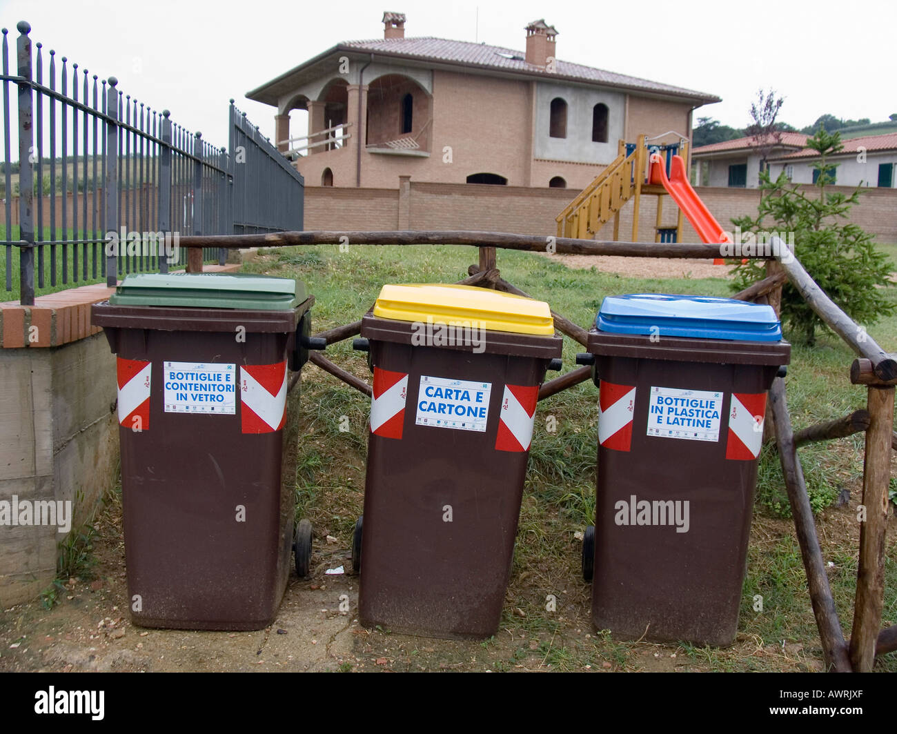 Ecologically friendly and color coded recycling waste containers ouside
