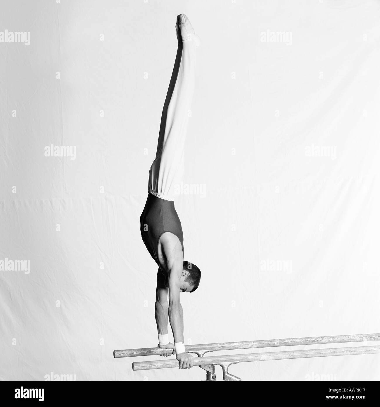 Gymnast On Parallel Bars Stock Photos & Gymnast On Parallel Bars Stock