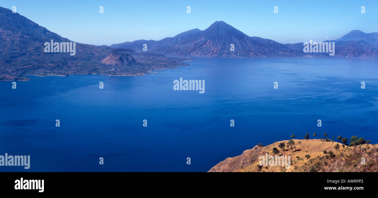 The road above San Antonio Palopo offers panoramic views of Lake Atitlan and the volcanoes GUATEMALA Stock Photo
