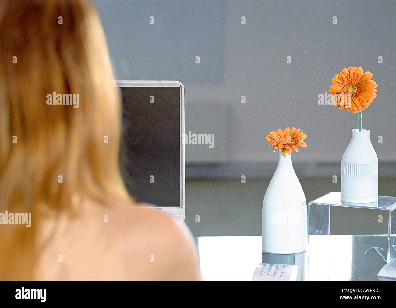 Rear view woman blurry hi-res stock photography and images - Alamy