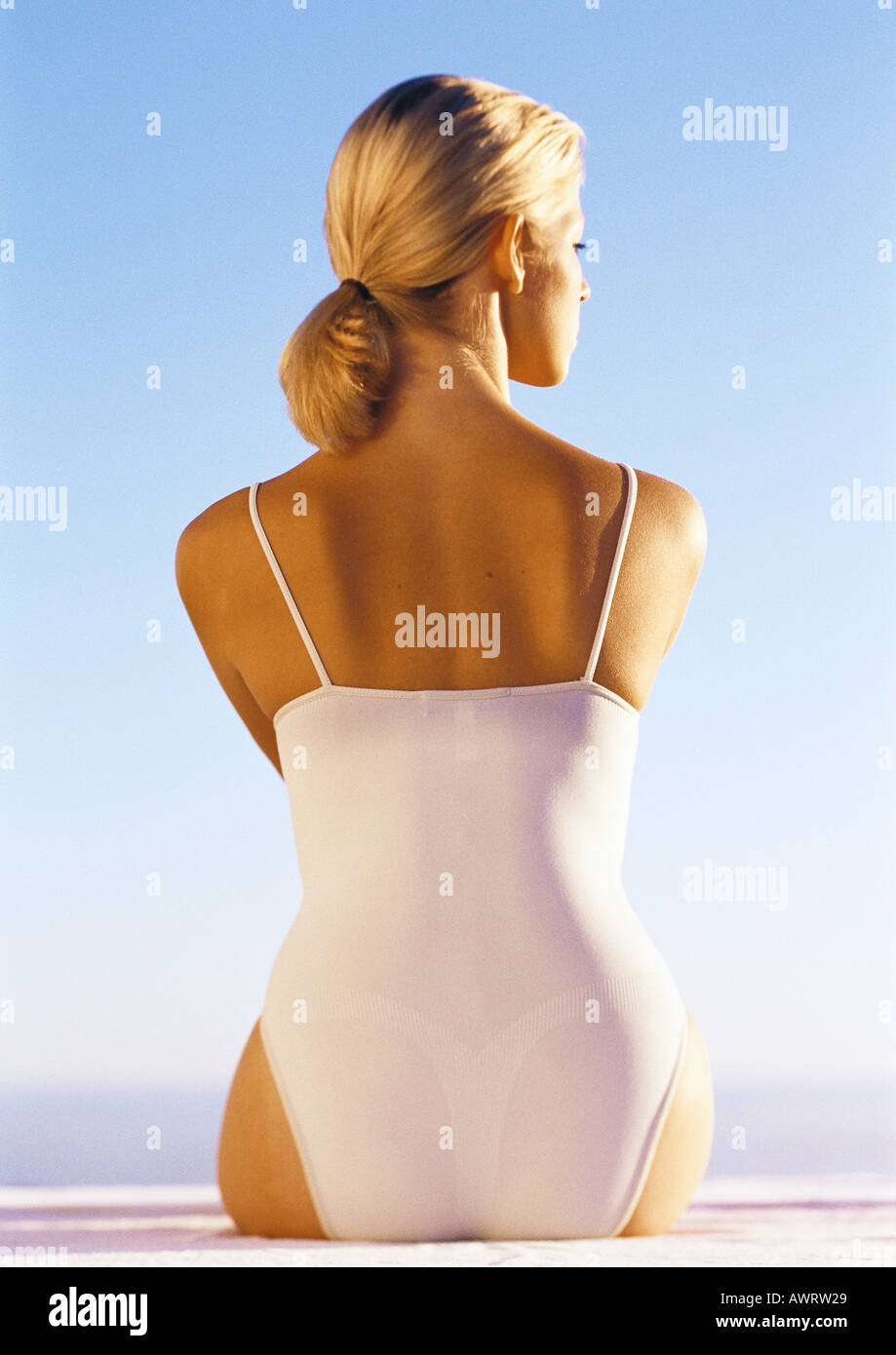 Woman in one-piece bathing suit, rear view, close-up Stock Photo