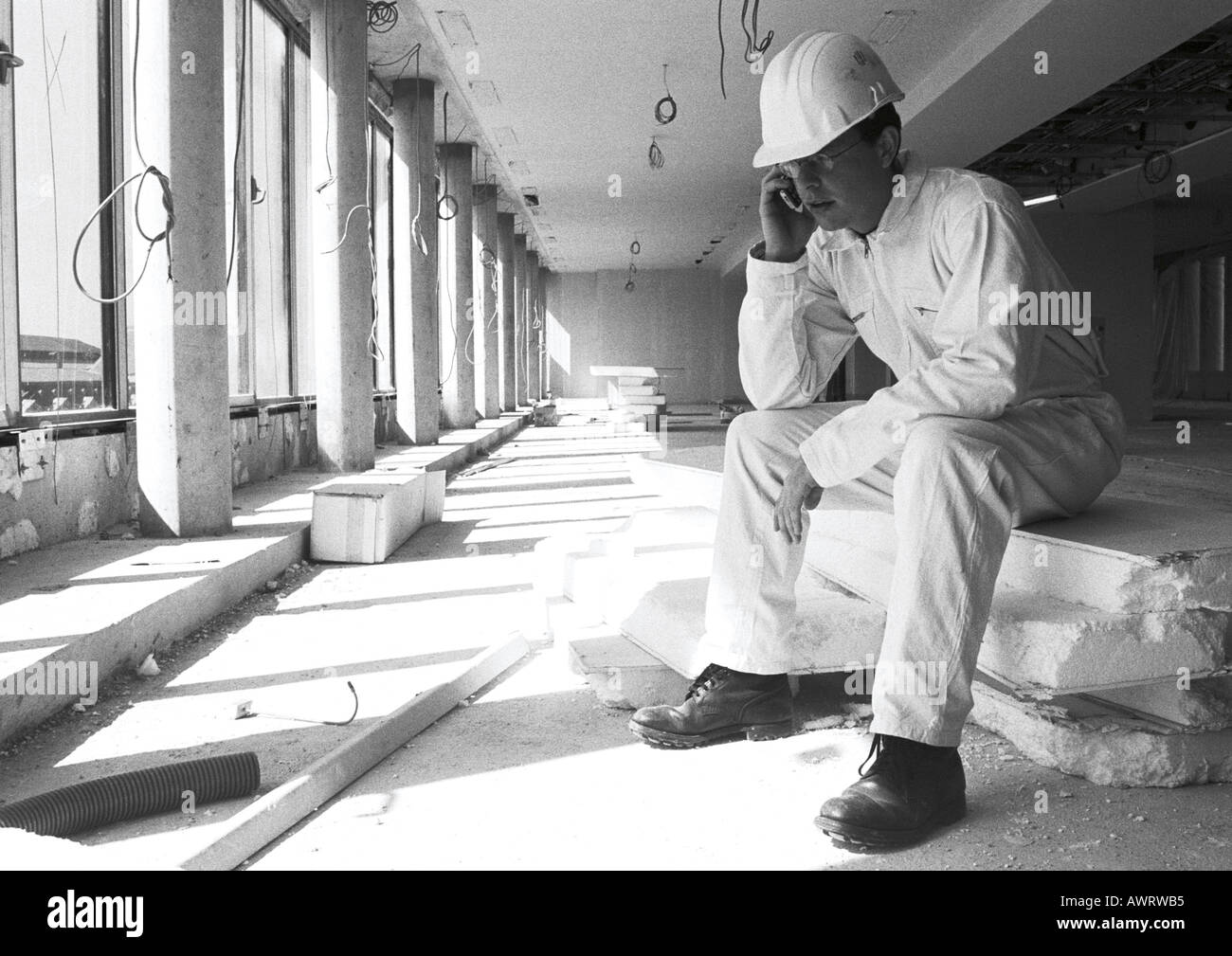 Builder works construction site worker Black and White Stock Photos ...