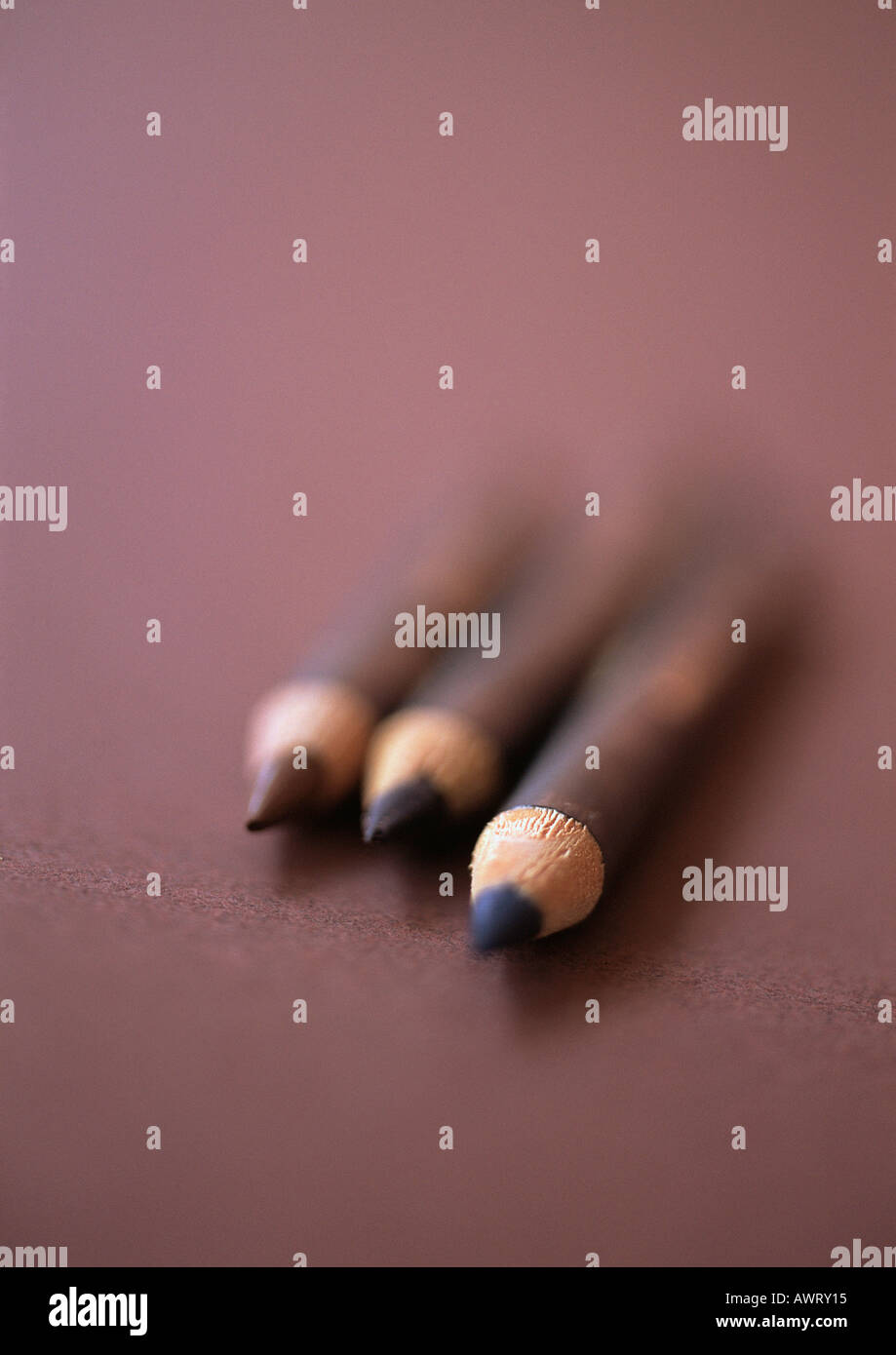 Eyebrow pencils, close-up, blurred Stock Photo