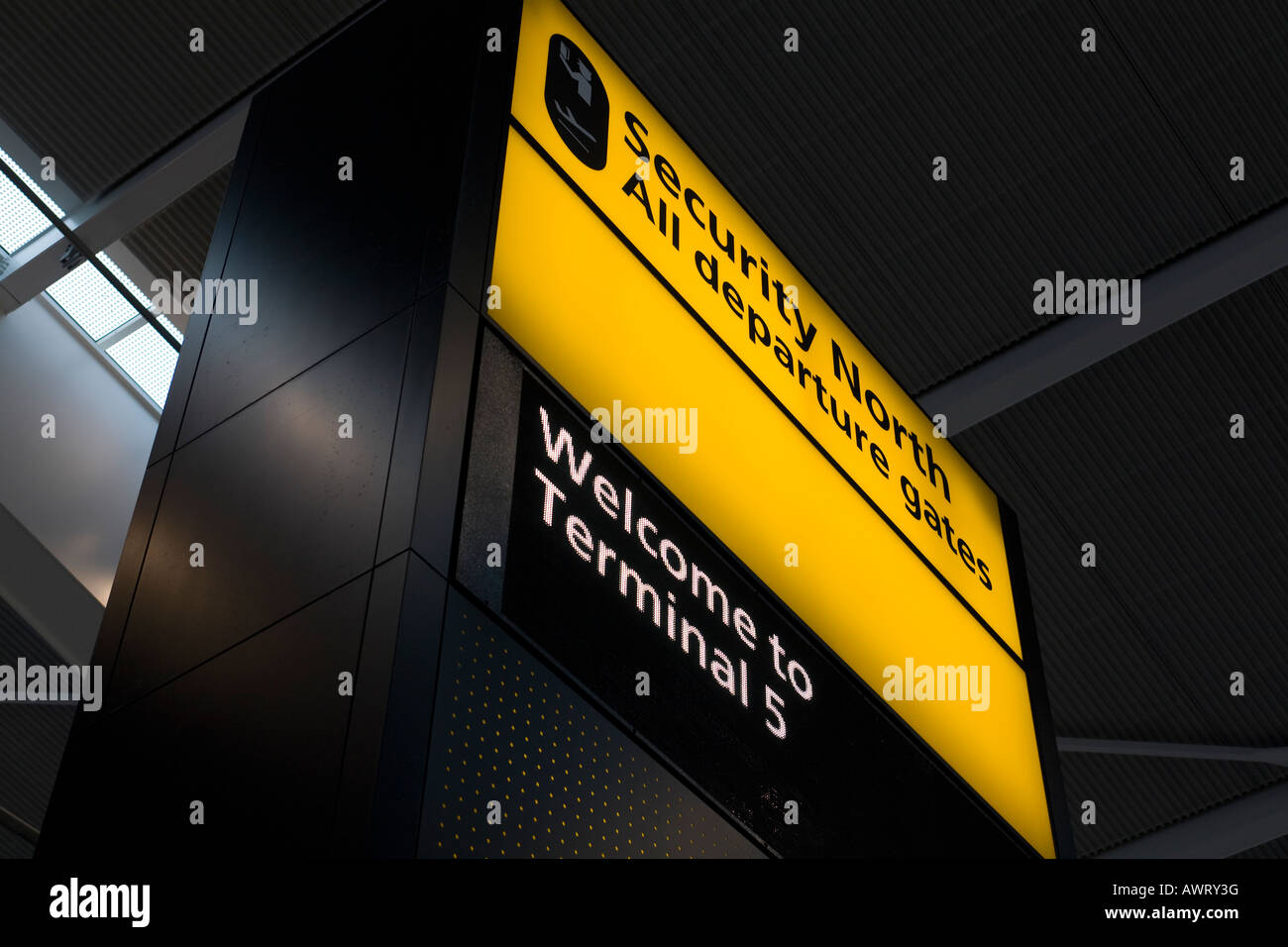 Security and welcome notice sign at London Heathrow Airport Terminal 5 Stock Photo
