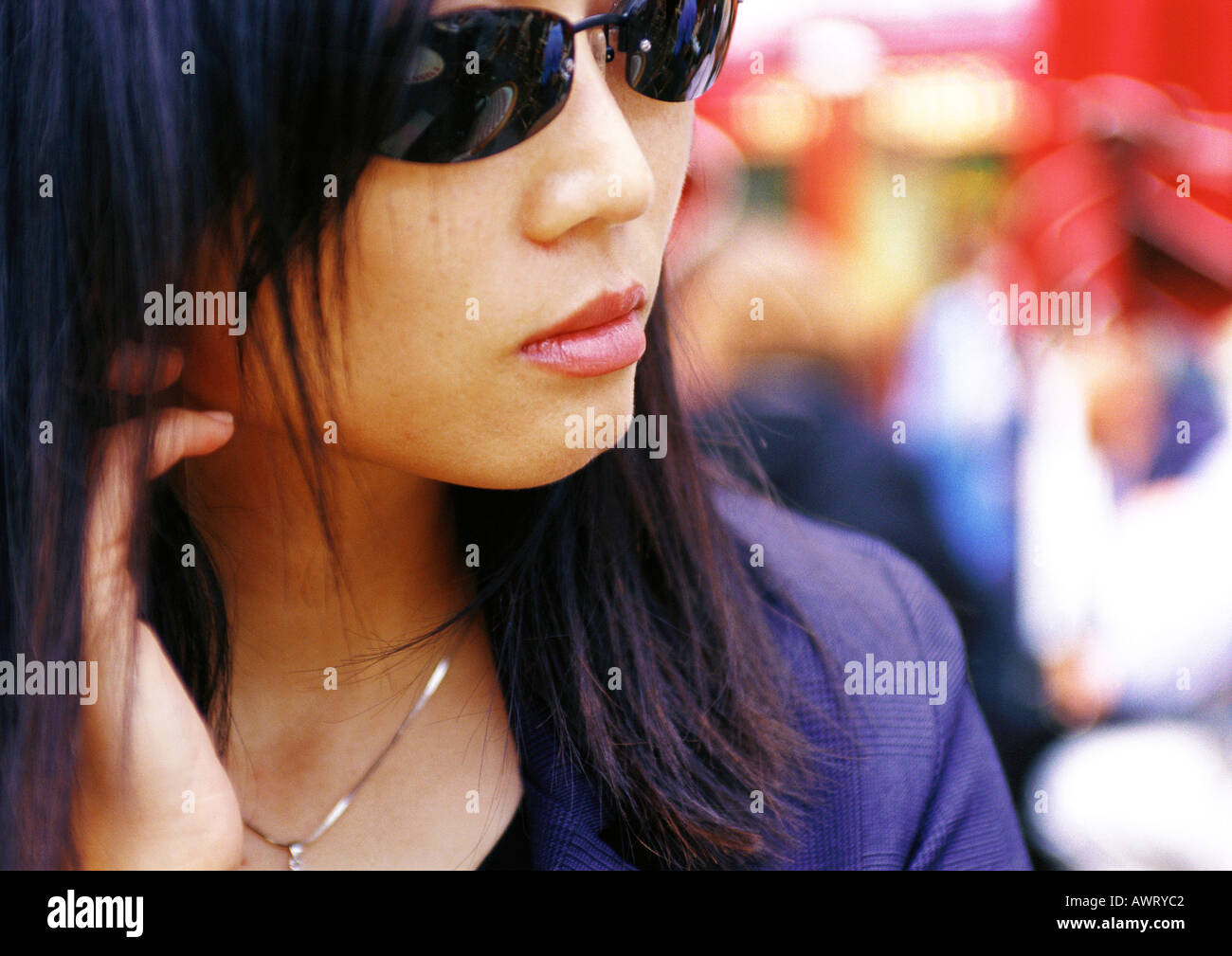 Serious asian woman sunglasses hi-res stock photography and images - Alamy