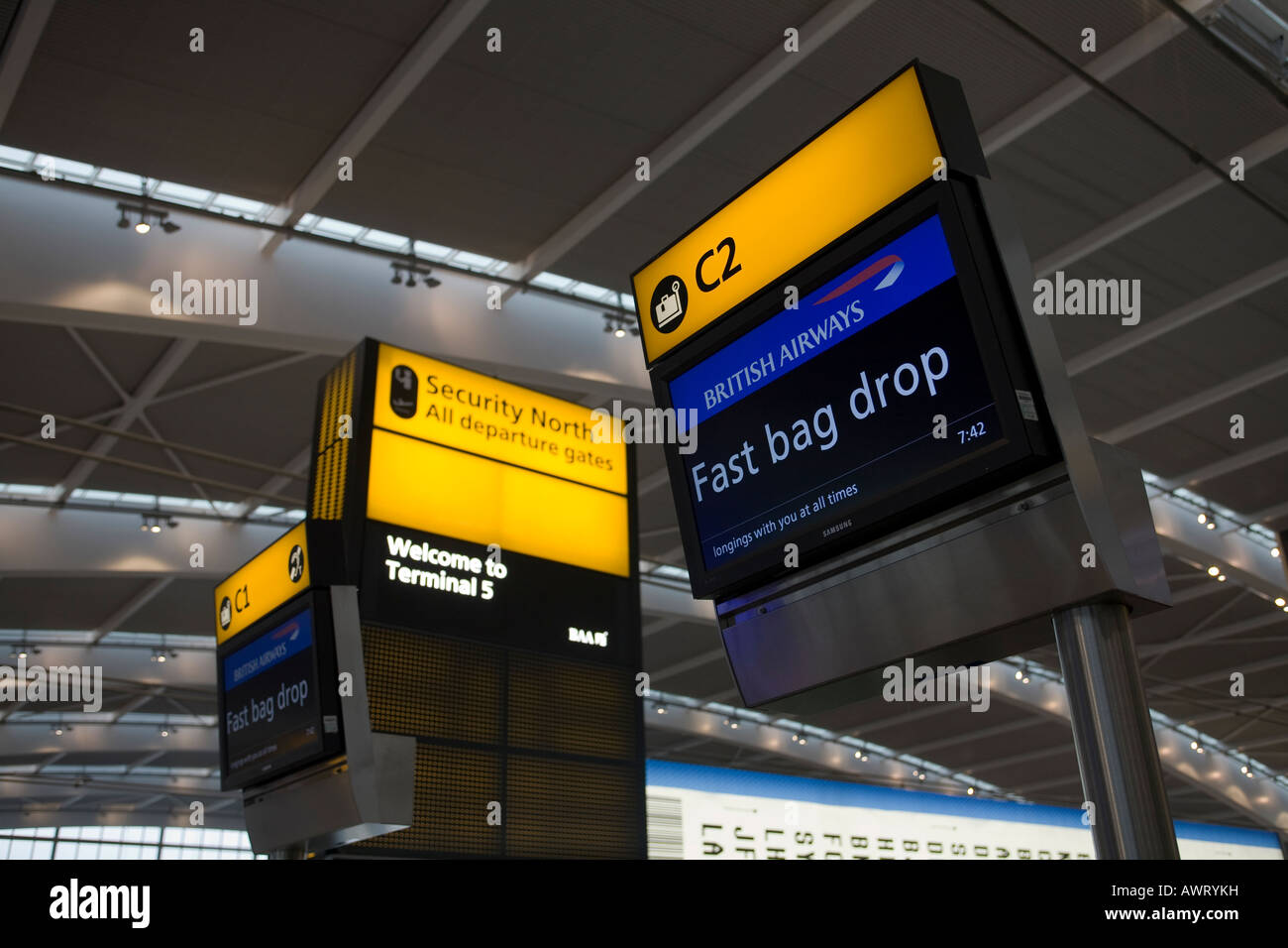 A British Airways Fast Bag drop and welcome sign at London Heathrows new Terminal 5 Stock Photo