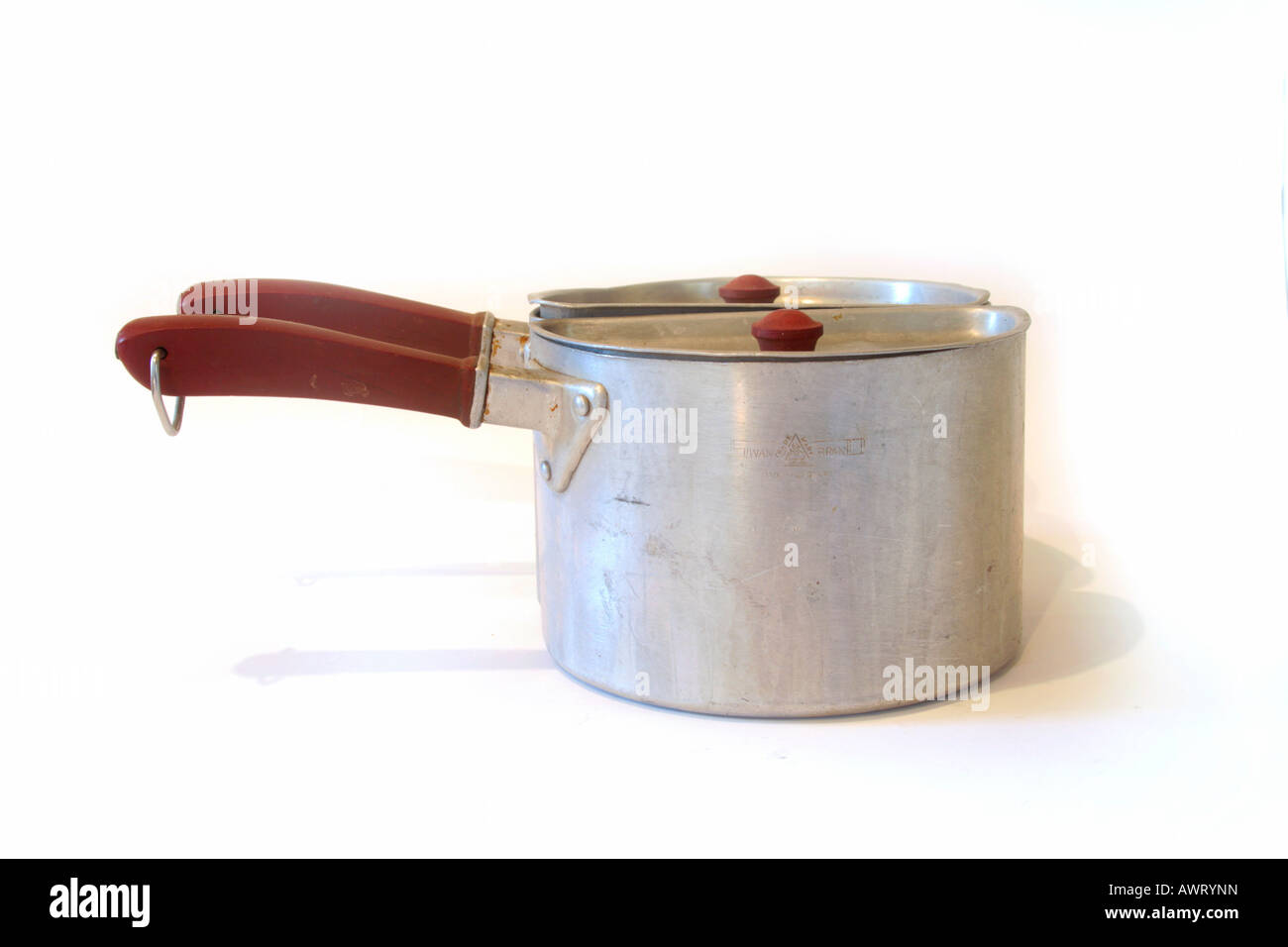 Swan split saucepans. Divided saucepans. Two half saucepans that use