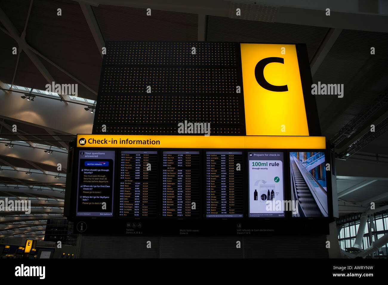 An electronic destination and arrival board at London Heathrow Airport Terminal 5 Stock Photo