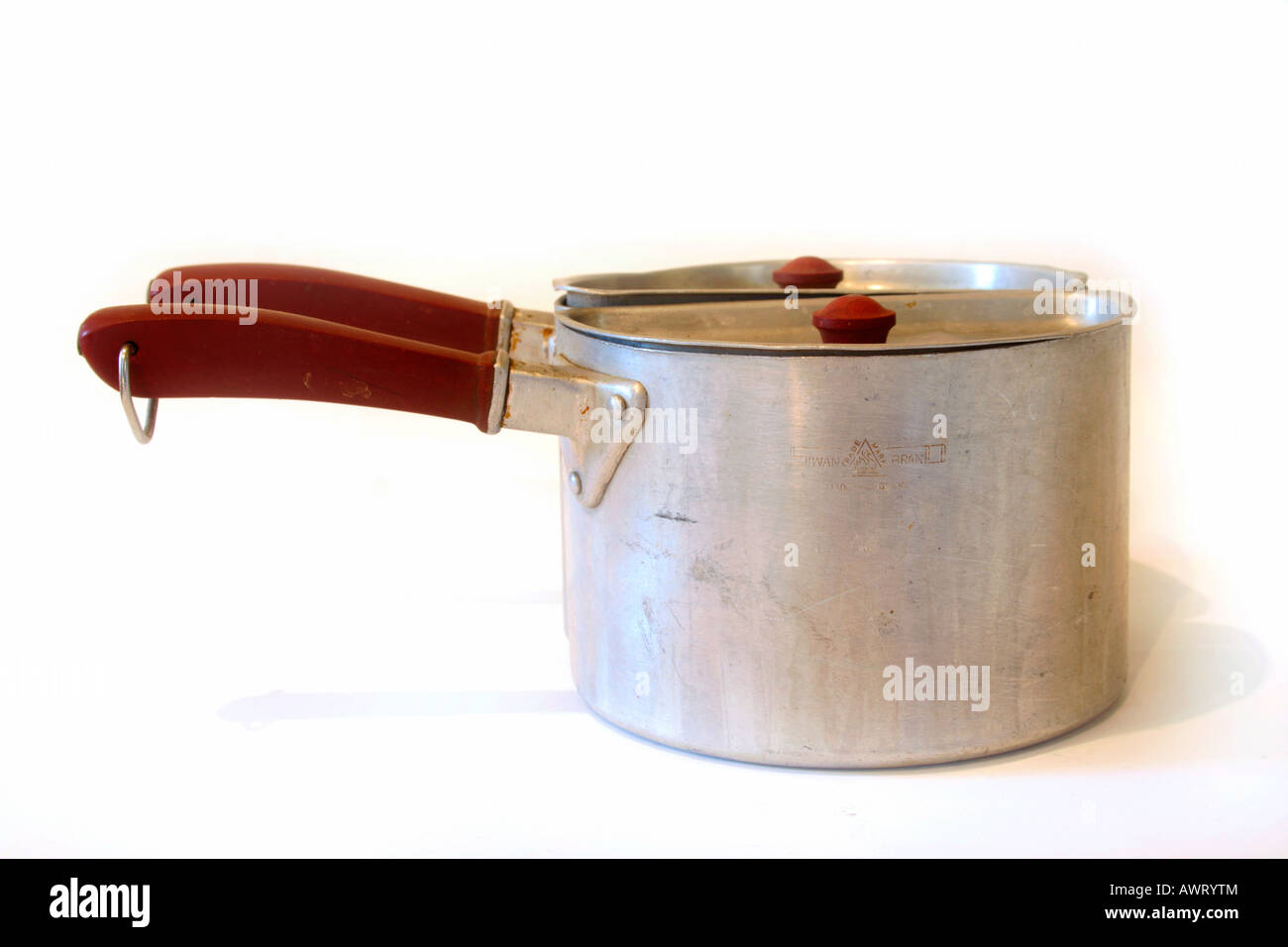 Swan split saucepans. Divided saucepans. Two half saucepans that use