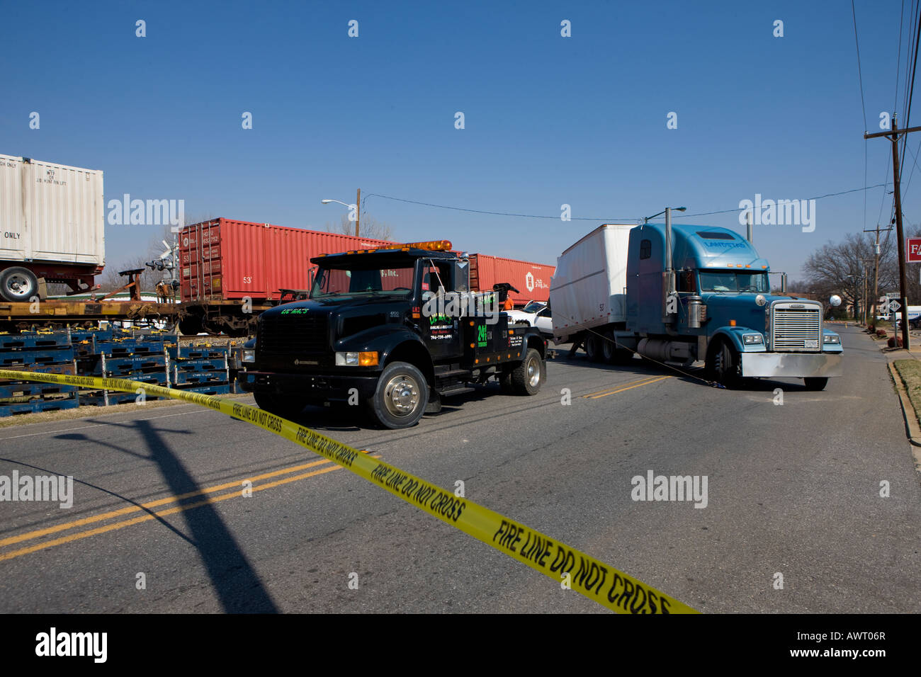A tractor trailer was hit by an freight train at a railroad