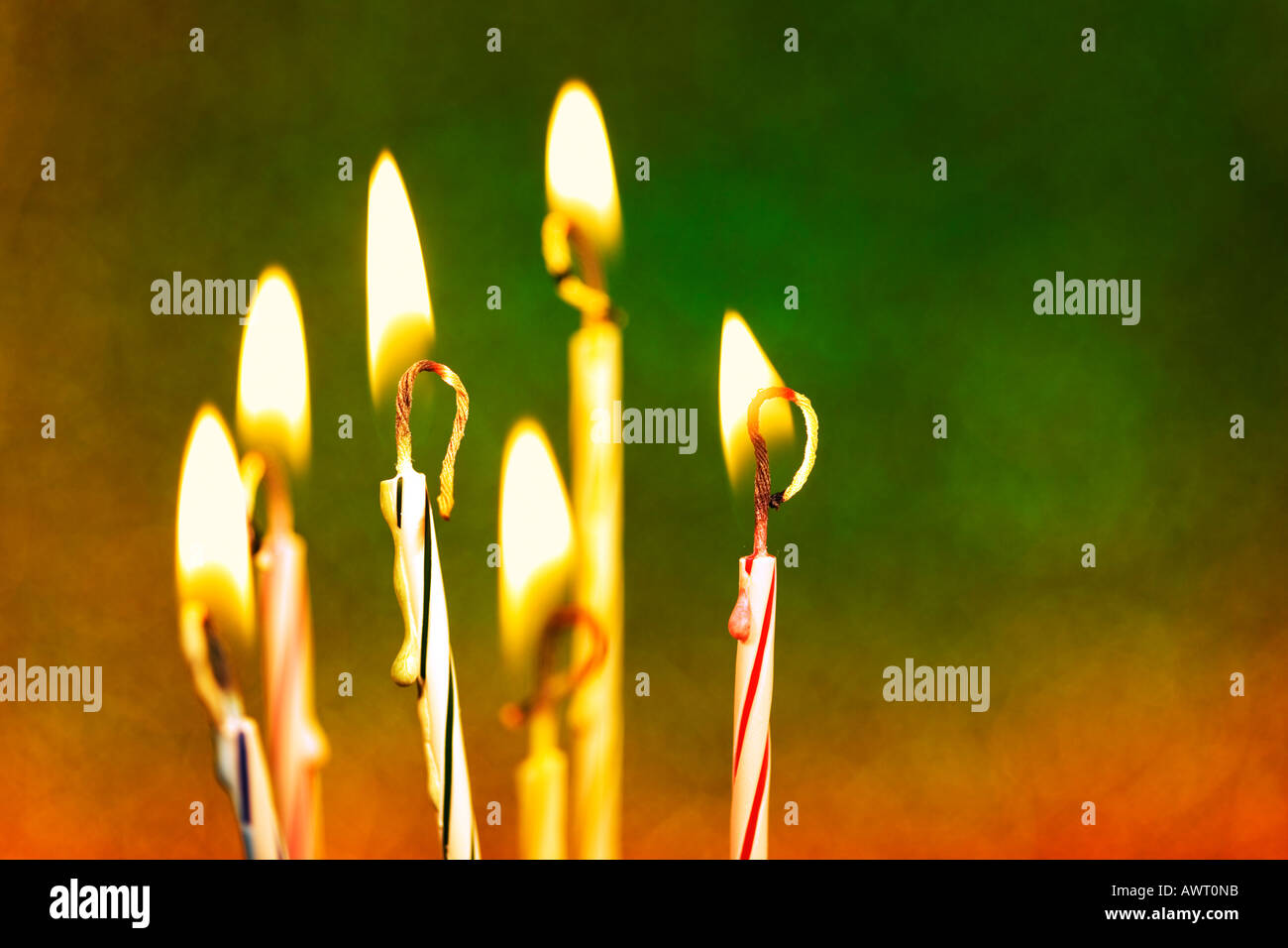 Burning colored birthday candles Stock Photo Alamy