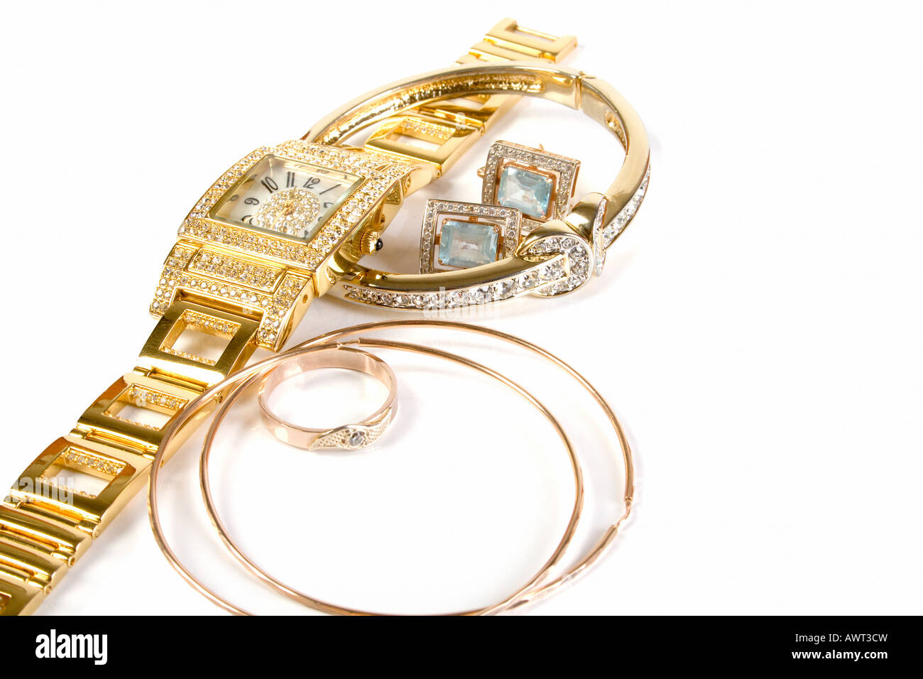 Golden clock and jewellery Stock Photo Alamy