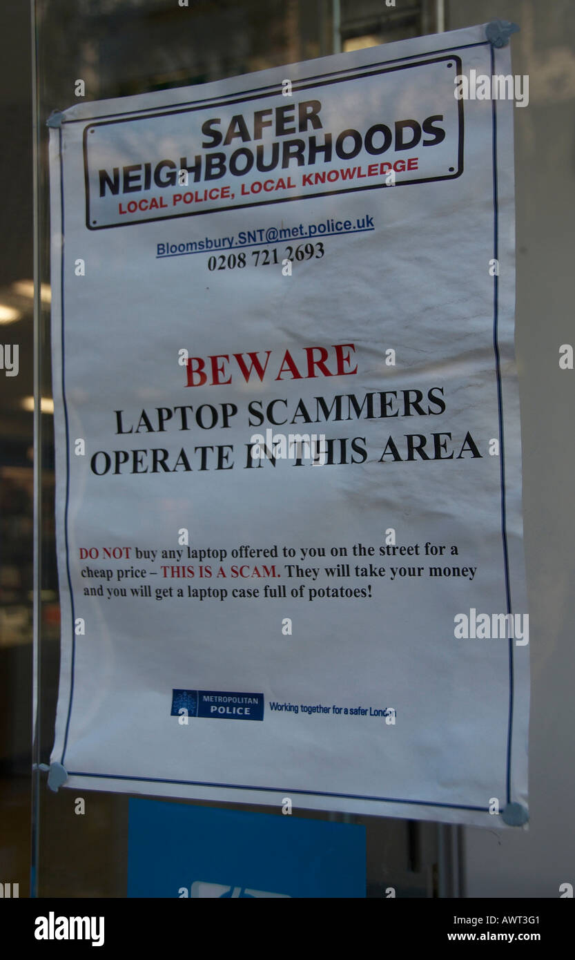 Poster alerting of the presence of scammers operating in central London Stock Photo