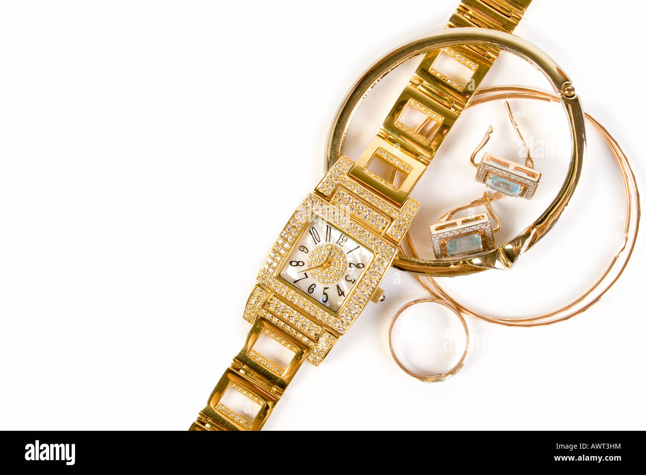 Golden clock and jewellery Stock Photo Alamy