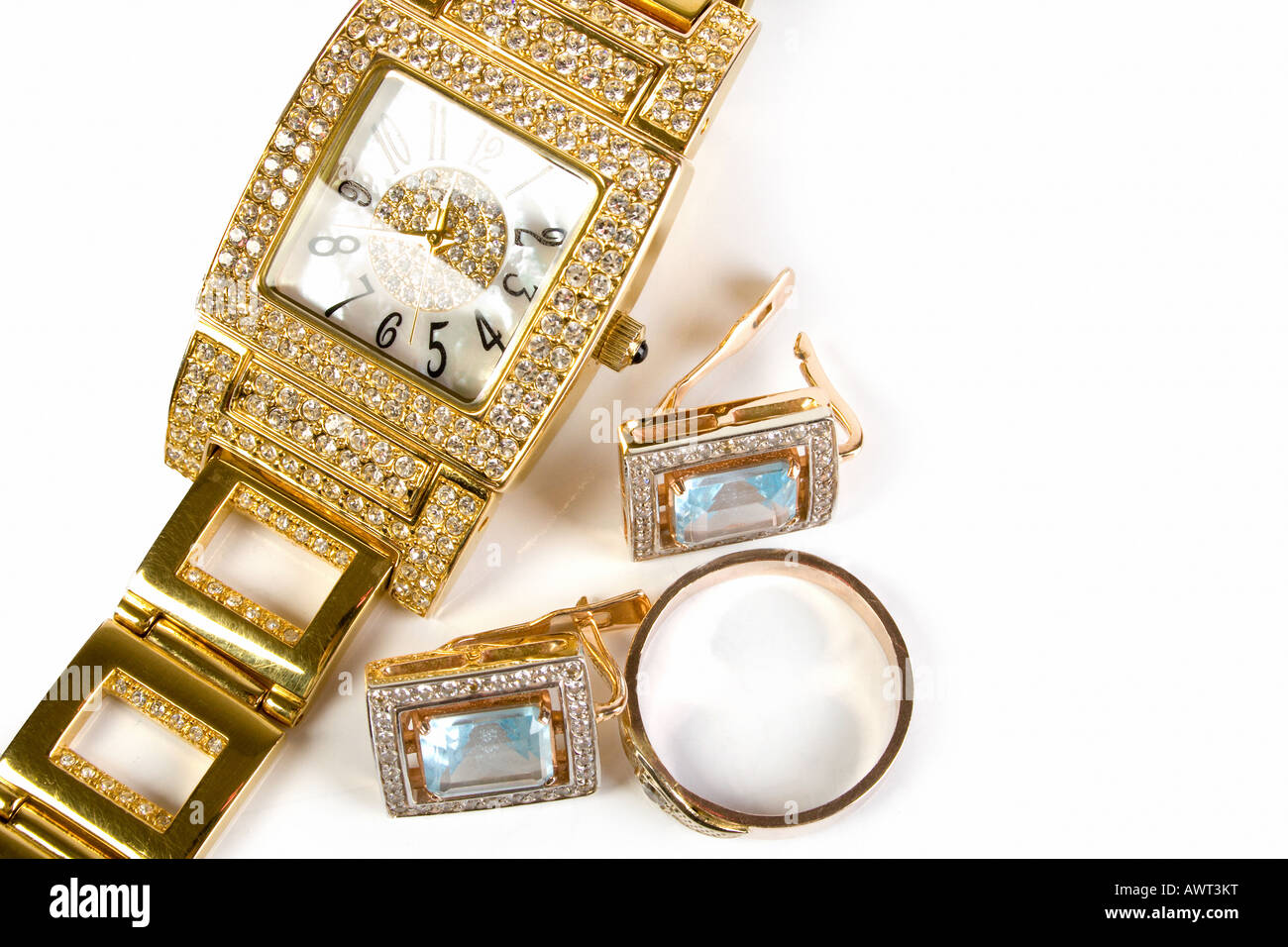 Golden clock and jewellery Stock Photo Alamy