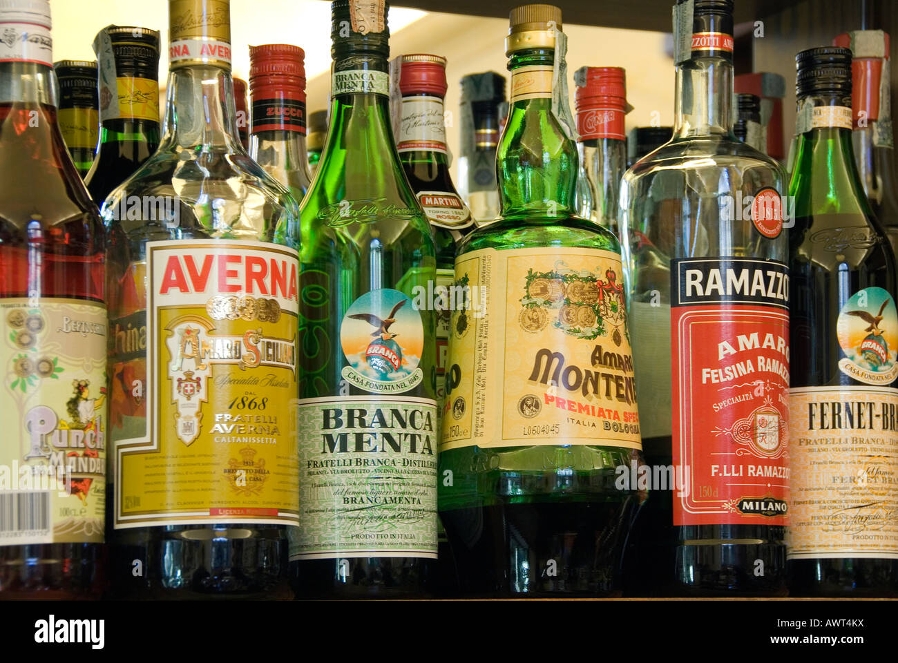 Top shelf of spirits and liqueurs in an Italian bar Stock Photo Alamy