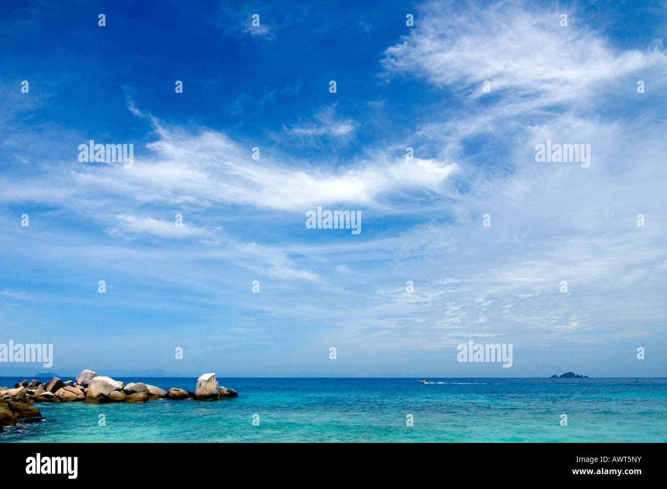 Tropical beach with clouds in blue sky Stock Photo - Alamy