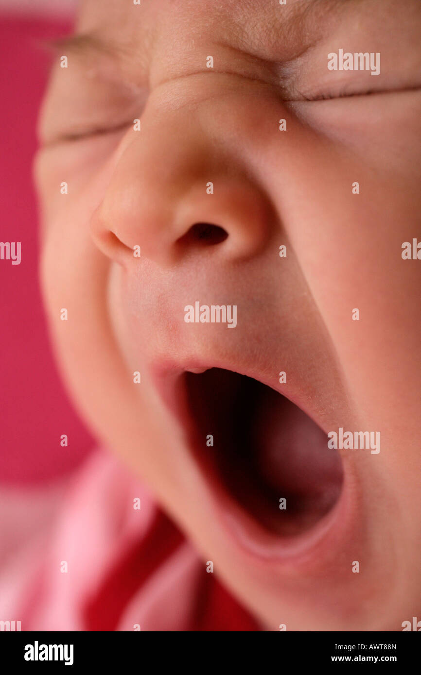 Yawning baby Stock Photo