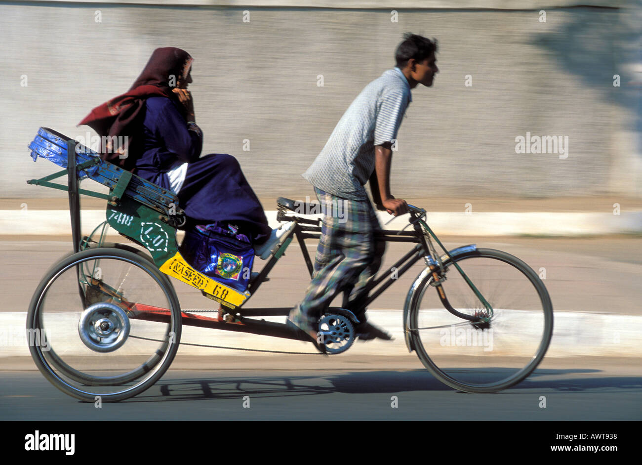 Indian man drives a rickshaw New Delhi India Stock Photo