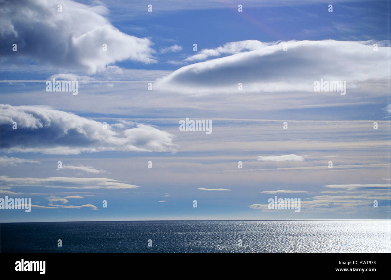 Clouds and sky Lenticular Altocumulus clouds over the sea Stock Photo