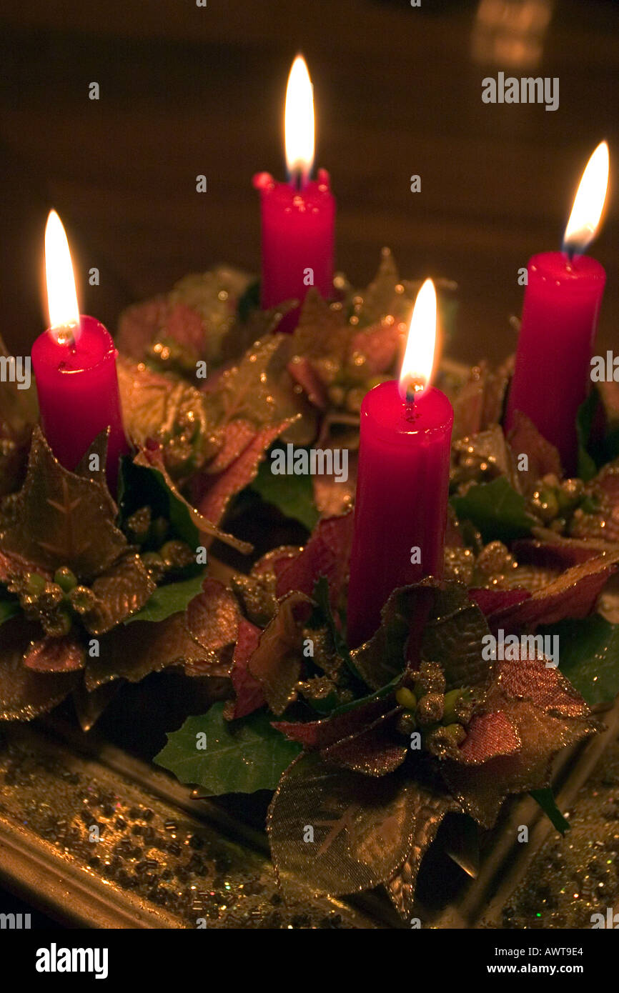 red votive candles burning in a french table for christmas Stock Photo