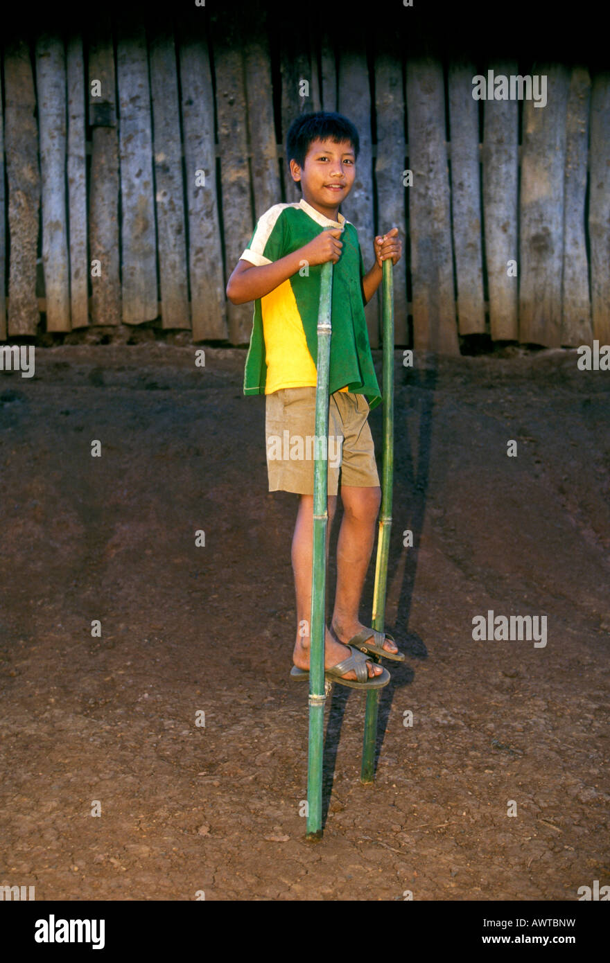 Walking on bamboo stilts hires stock photography and images Alamy