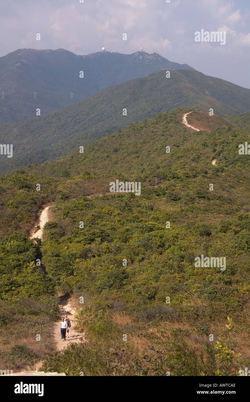 dh Shek O country park DRAGONS BACK HONG KONG Hikers on footpath trail hiking china walking Mount Collinson and Mount Parke ramblers island hike Stock Photo