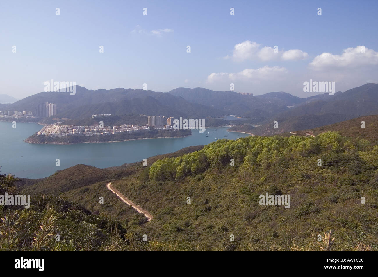 dh  TAI TAM HARBOUR HONG KONG Red hill apartment flats Shek O country park view from Dragons back path Stock Photo