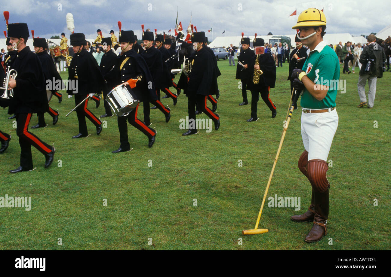 Smiths Lawn, Guards polo ground, military brass band plat at the start of a polo match. Windsor Great Park England  UK 1980S 1985 HOMER SYKES Stock Photo
