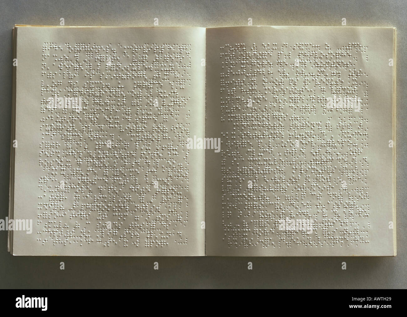 Open book with brail on pages Stock Photo