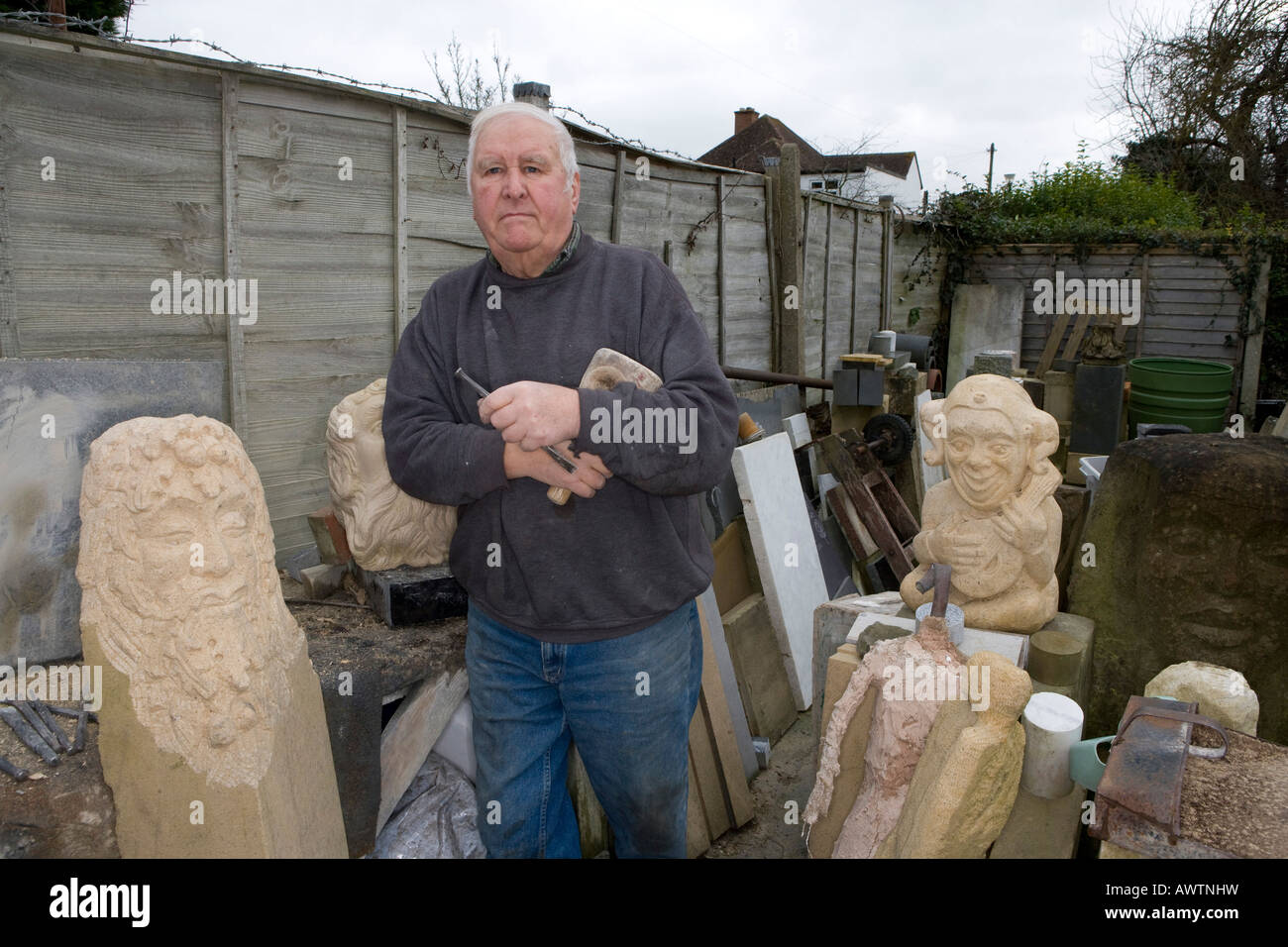 Bill Brown stonemason and carver at his Kidlington home and workshop Stock Photo