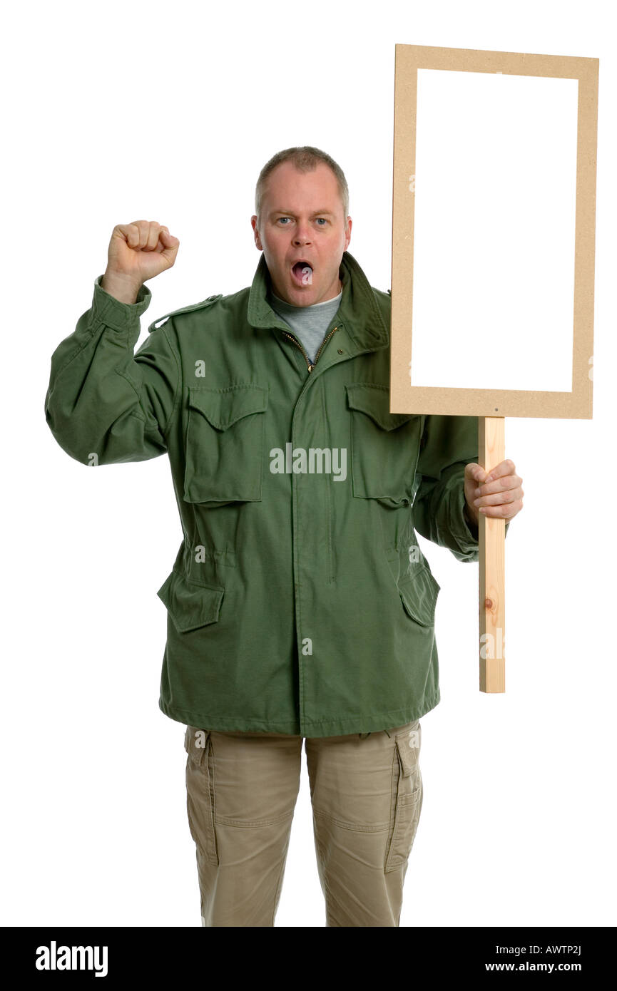 Protester with blank placard and raised fist Stock Photo